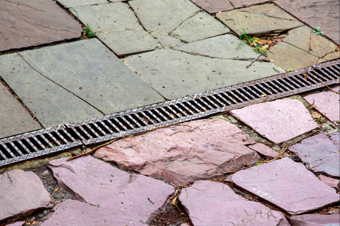Key Drainage Solutions for Patios, Walkways, and Yards